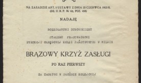 Dyplom nadania brązowego krzyża zasługi Bolesławowi Dunowskiemu, stałemu pracownikowi dyrekcji okręgowej kolei państwowych w Wilnie.